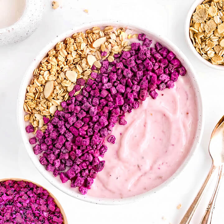 Yogurt bowl dragon fruit, and granola.