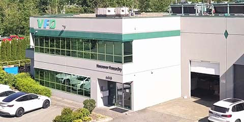 VFO building with cars parked in front