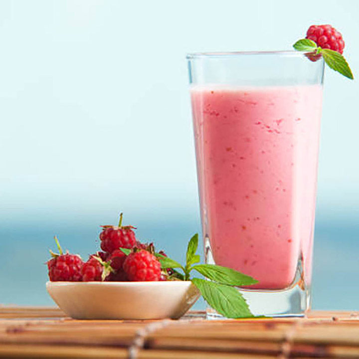 Raspberry smoothie on beverage shop background