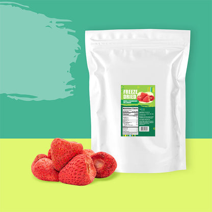 Freeze-dried strawberries with a white packaging bag on a green and yellow background